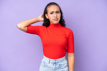 Young woman isolated on purple background having doubts