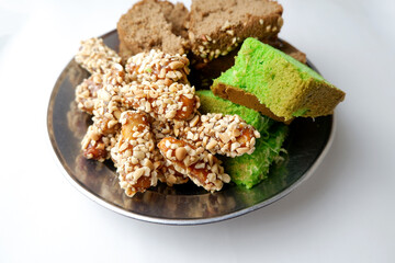 the peanut cake and green and chocolate sponge cake were so soft and delicious nestled on the plate