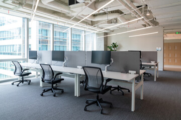 Interior of modern empty office building.Open ceiling design.Equipped with automatic lifting table...