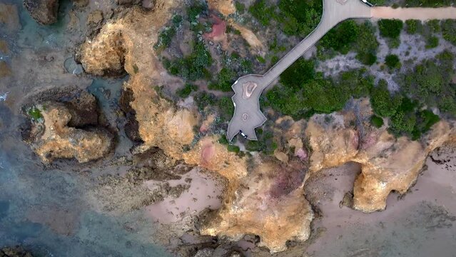 Bird's eye drone shot of Rocky Point Lookout in Jan Juc suburb of Torquay, Victoria, Australia