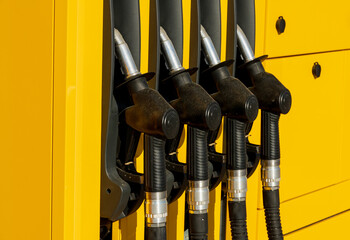 Fuel pumps station close up. Nozzles at the gas station
