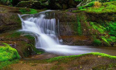 the water is running down the rocky creekbeds and into the ground