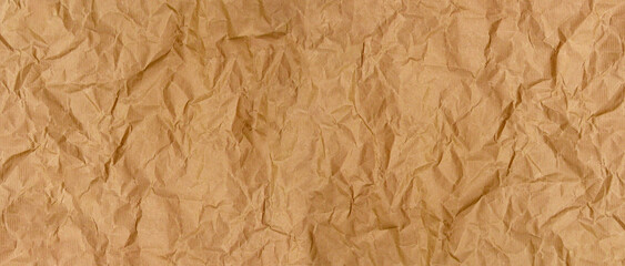 Crumpled brown kraft paper background