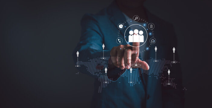 Customer relationship management,CRM Concept ,business network structure ,businessman touch person icon on virtual screen Represents the marketing strategy of organization business