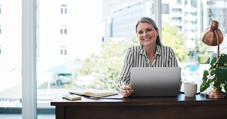 Mature woman, portrait and laptop for email in office, communication and site for ideas research....