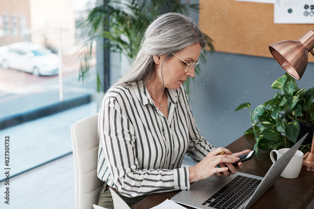 Poster phone, laptop and mature business woman reading email, networking and scroll on app in startup. smar