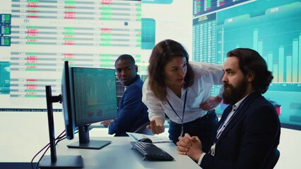 Irritated angry team leader screaming at her coworker after he failed to calculate expenditures, showing her disappointment in front of everyone. Furious dissatisfied business manager. Camera B.