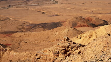 Makhtesh Ramon is a geological feature of the Israeli Negev Desert. Situated approximately 85 km south of the city of Beersheba, this landform represents the world's largest erosion circus. The format