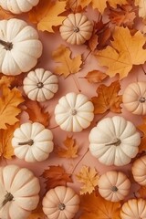 Autumn harvest scene with leaves, golden pumpkins, ample space for thanksgiving text, top view
