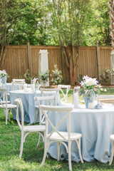 outdoor wedding tables with blue decorations