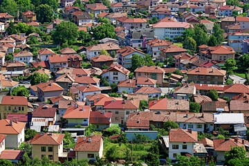 Top view of tiled roofs of houses