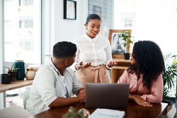 Meeting, discussion and business people startup on table for planning, project ideas and brainstorming. Teamwork, communication and workers talking, working on laptop and goals in workplace.