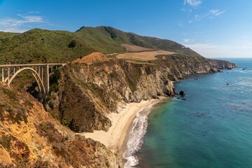 Aerial view of Bixby Creek Bridge above Big Sur, California Coast along Highway 1