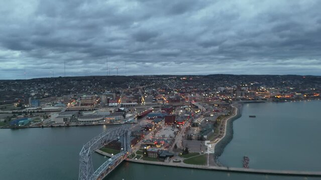 Drone footage of Canal Park and Aerial Lift Bridge in Duluth city at sunset in Minnesota, USA