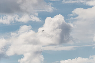 Jet airplane sweeping across the sky.