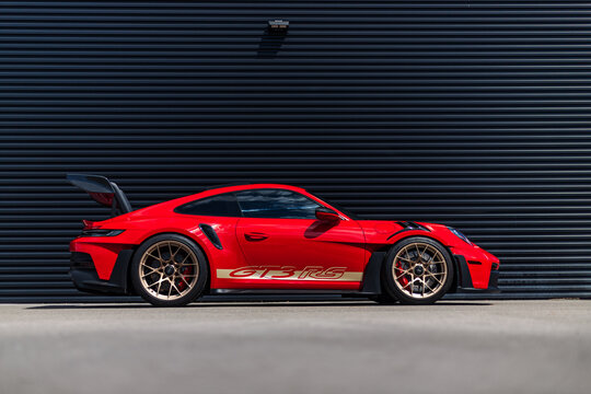 Stunning Guards Red 992 Porsche GT3 RS with Aurum Gold wheels