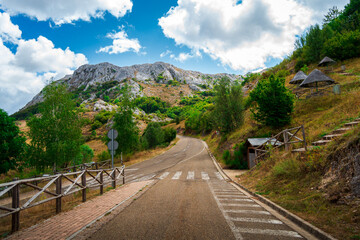Scenic view of Asturias, Spain's rocky mountains on a cloudy day with vibrant colors