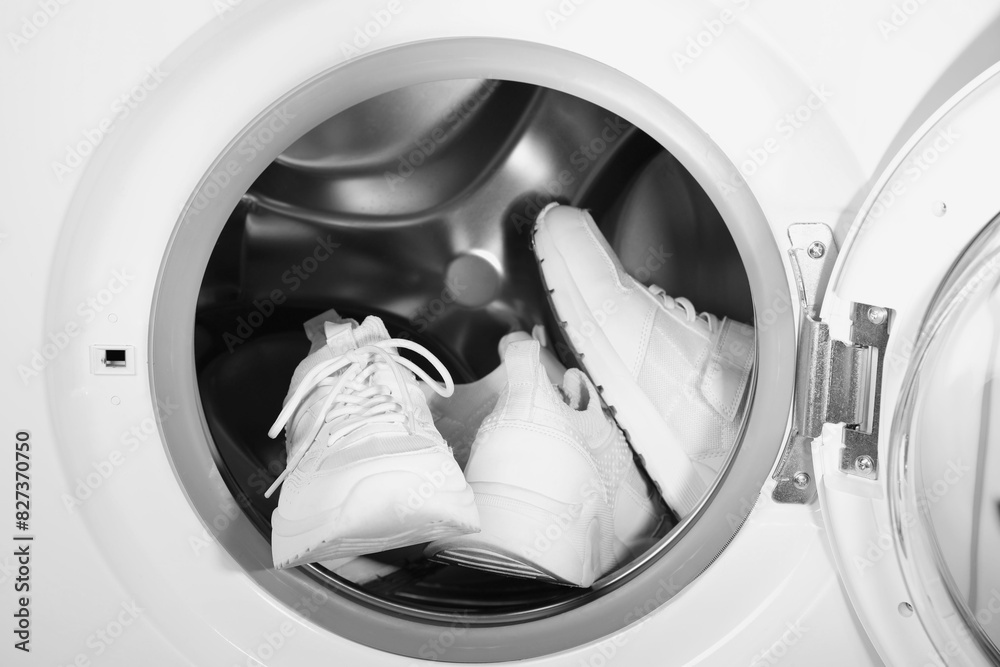 Canvas Prints Stylish clean sneakers inside modern washing machine