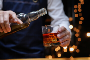 Bartender Serve Whiskey, on wood bar, 