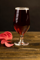 dark beer in a glass glass, fresh dark beer