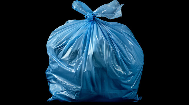 A tied blue garbage bag against a black background.