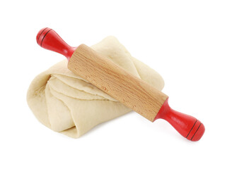 Raw dough and rolling pin isolated on white