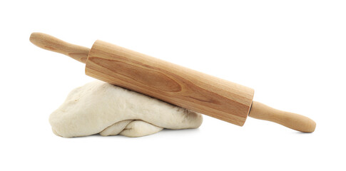 Raw dough and rolling pin isolated on white