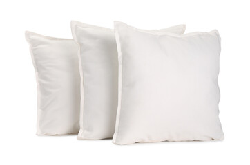 Many new soft pillows isolated on white