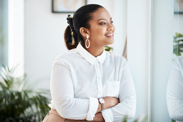 Business woman, happy or thinking with arms crossed in office for corporate growth and work goals. Female person, idea or vision looking out window with hope, confidence and smile at career progress