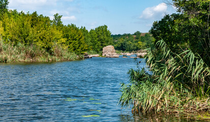 Natural landscape, the bed of the Southern Bug river with granite rifts in the Nikolaev region