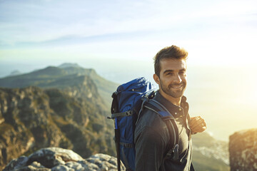 Portrait, sunshine and hiking with man, fitness and journey with nature, smile and getaway trip....