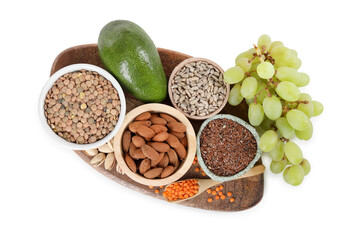 Board with different seeds, nuts and products high in healthy fats isolated on white, top view