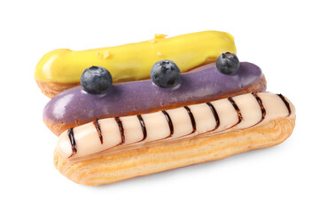 Delicious eclairs covered with glaze isolated on white