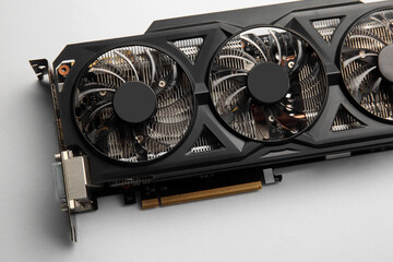 One graphics card on color background, top view