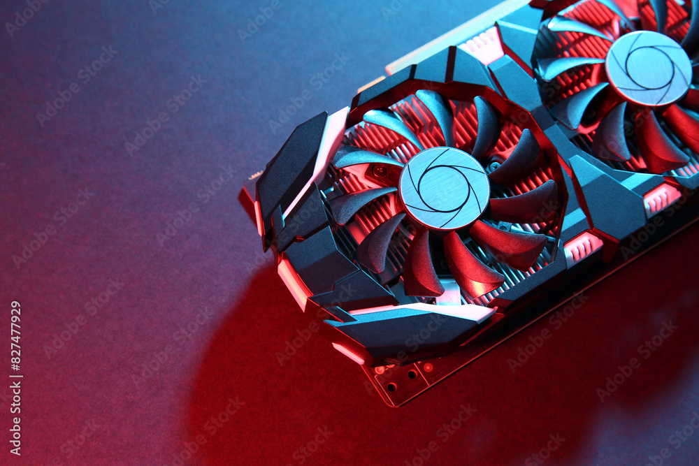 Fototapete computer graphics card on color background, top view. space for text