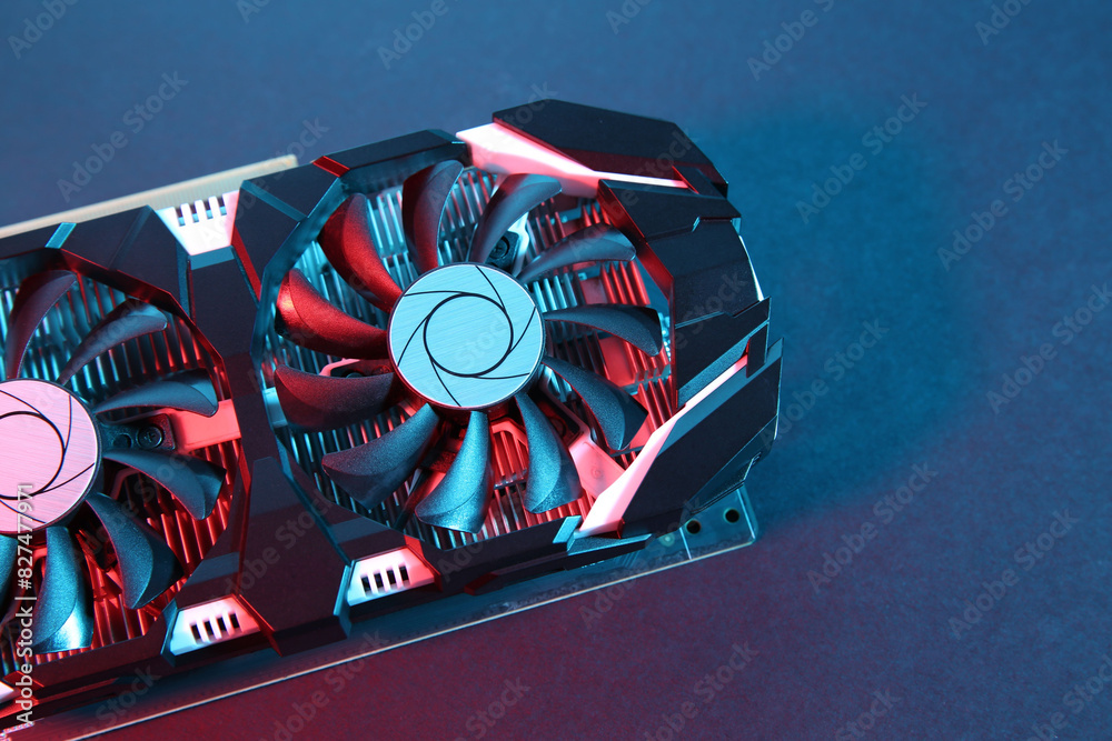 Fototapete computer graphics card on color background, top view. space for text