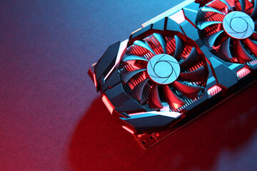 Computer graphics card on color background, top view. Space for text