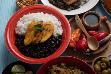 Black beans and white rice with fried plantains banana cuban venezuelan food