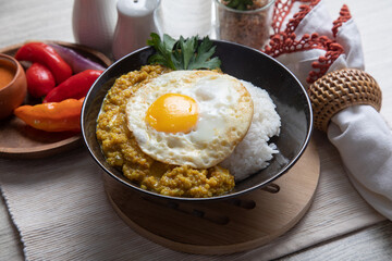 Quinua quinoa stew with cheese and fried egg peru peruvian andean food