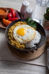 Quinua quinoa stew with cheese and fried egg peru peruvian andean food