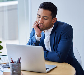 Bored, tired and business man on laptop in office with burnout, overwork and reading project deadline email. Depression, stress and professional with fatigue, anxiety and financial crisis challenge