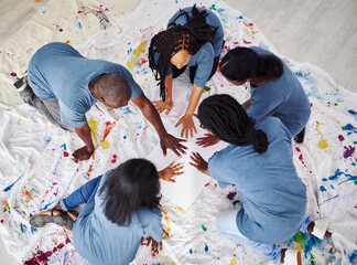 Team, hand paint and canvas on art studio floor for collaboration, community and support or...