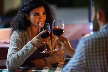 Toast, date and couple with love, smile and marriage with happiness, celebration and restaurant. People, red wine and man with woman, dinner or trust with alcohol, romance and relationship with care