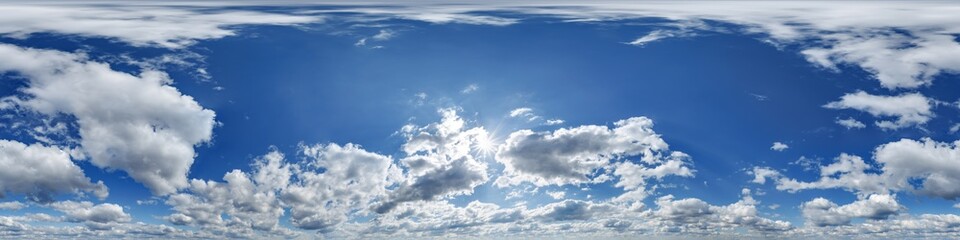 blue sky 360 hdri panorama view with zenith and clouds for use in 3d graphics or game development as skydome or edit drone shot or sky replacement in equirectangular seamless projection © hiv360