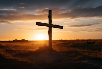 Cross of Jesus Christ at sunset in the countryside. Easter concept.