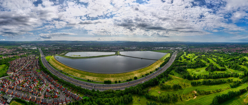 Aerial image of Audenshaw reservoirs and M60 outer ring road in Audenshaw , Manchester