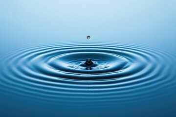 Ripples of Action: A Single Droplet Impacting Serene Blue