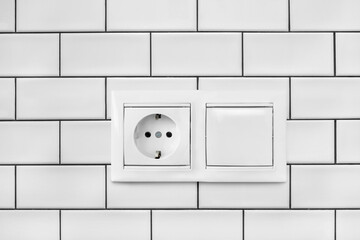 Socket and switch on a wall