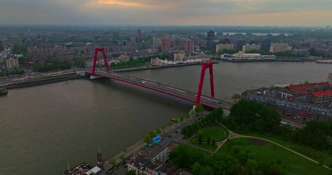 Aerial view Rotterdam, Netherlands. Willemsbrug Bridge. Noordereiland Island. View of the city center. River Nieuwe Maas. Sunset