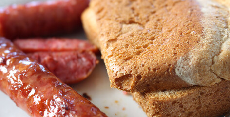 bread and sausage. Meal with sausages and bread. details of the meal.